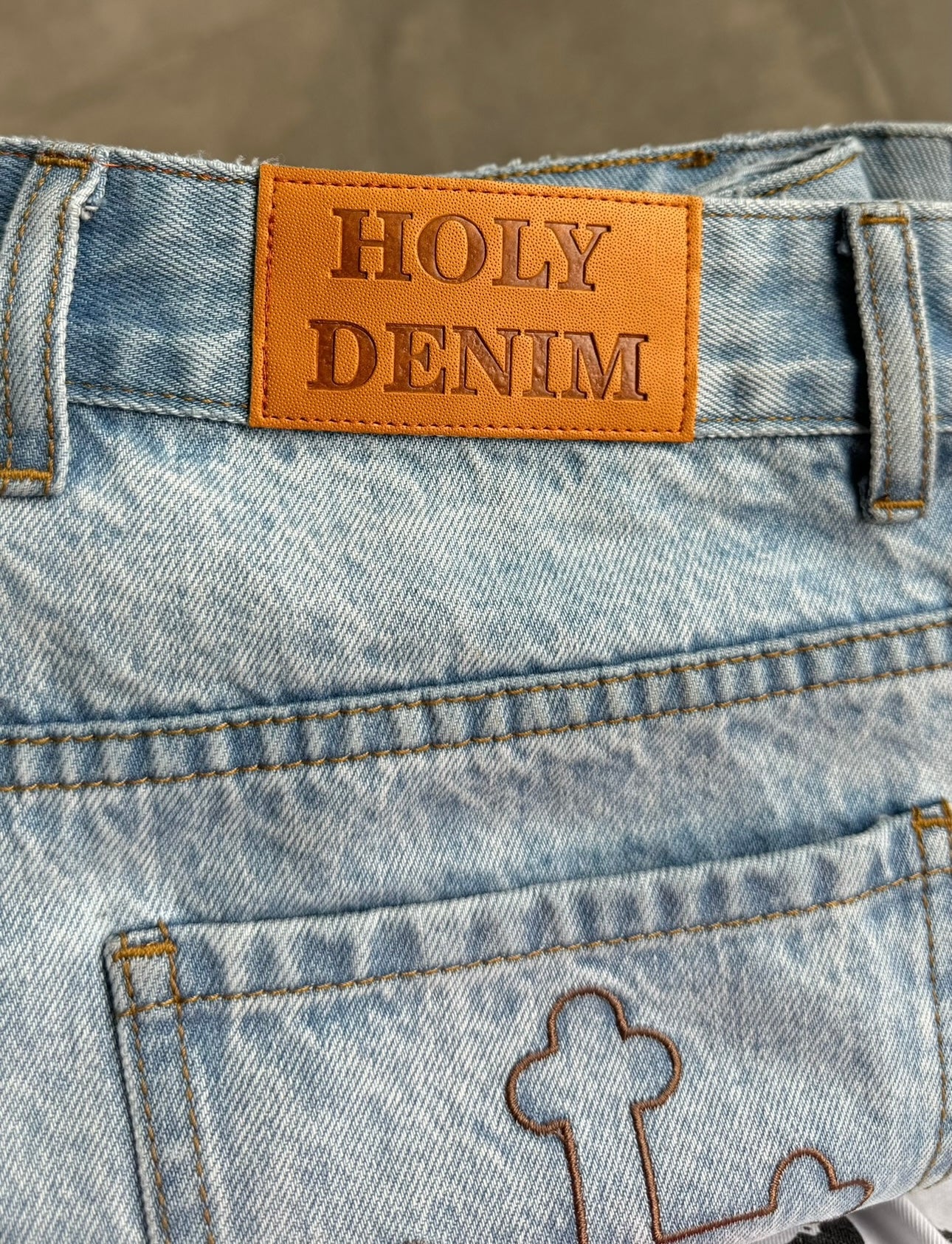 HOLY DENIM